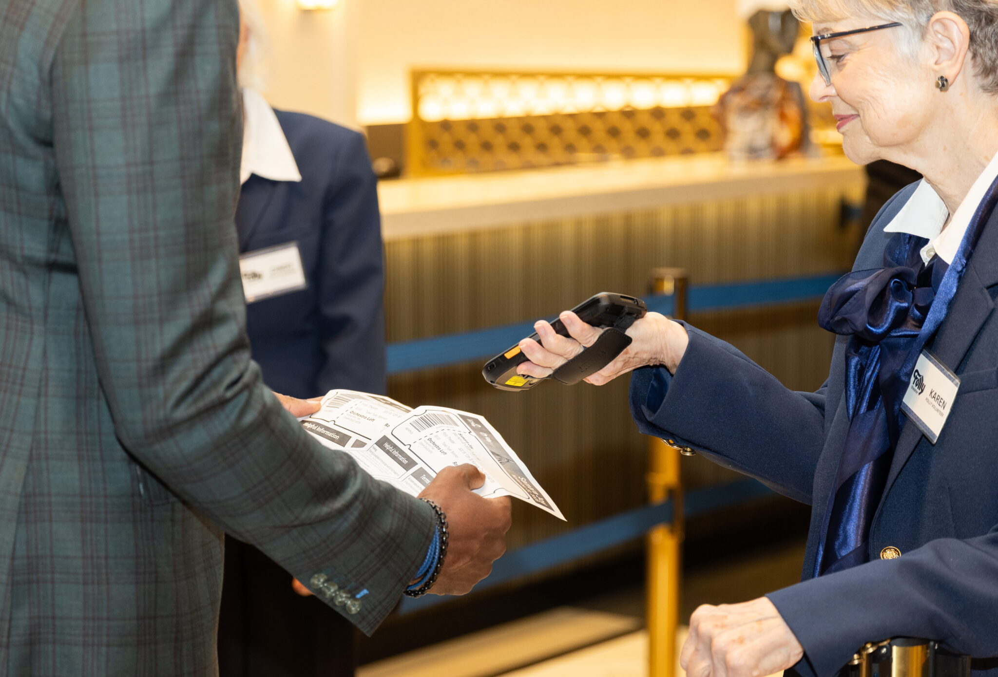 Women scanning a persons paper